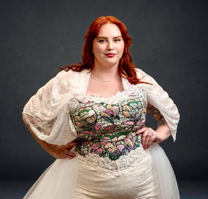 Elegant & Inclusive-This design highlights my commitment to curvy body shape, proving that high-end couture belongs to every body. The corset features a mix of African print and floral embroidery, providing both structural support and a striking visual foc